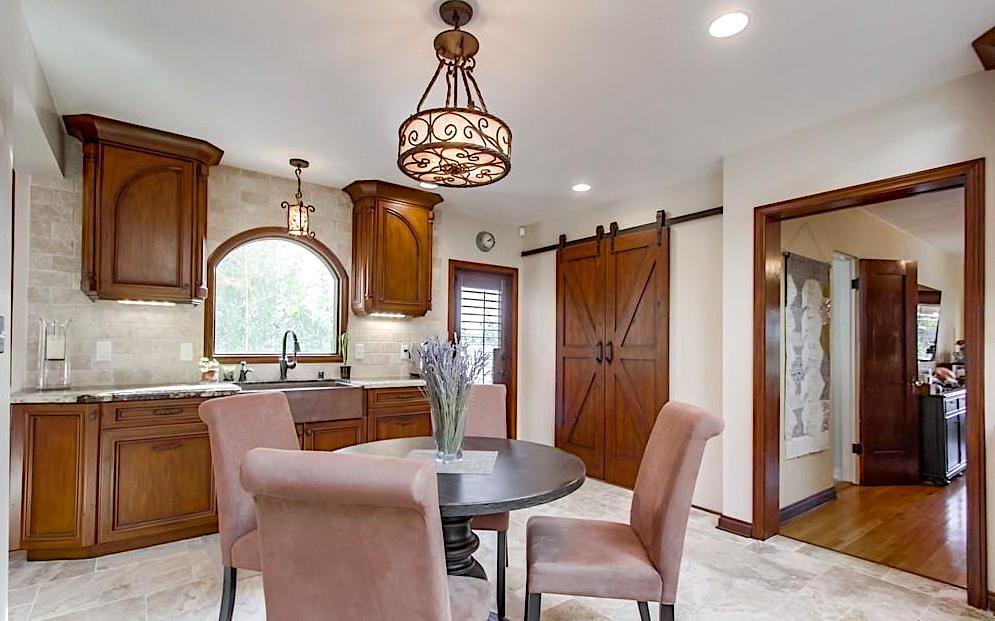 Knotty alder cabinets, large crown molding, and recessed panel doors